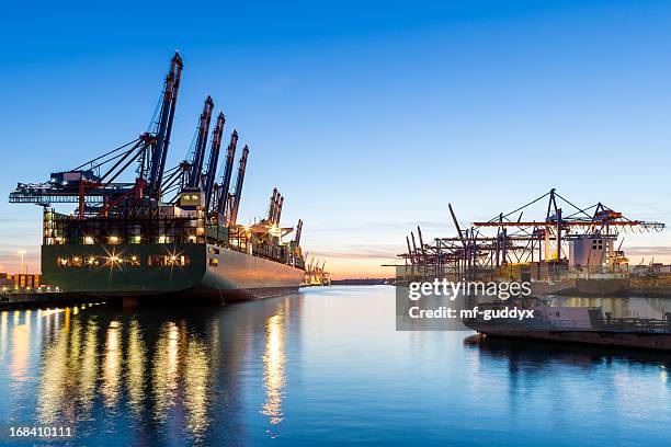 hamburg harbour, cargo terminal - cargo container crane stock pictures, royalty-free photos & images