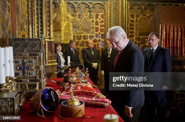 The Czech President Milos Zeman looks at the Czech Crown Jewels before the opening of The Bohemian Crown Jewels Exhibition 2013 on May 9, 2013 in...