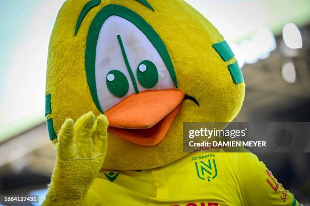 Nantes club's mascot, Riri le Canari waves during the French L1 football match between FC Nantes and FC Lorient at the Stade de la BeaujoireLouis...