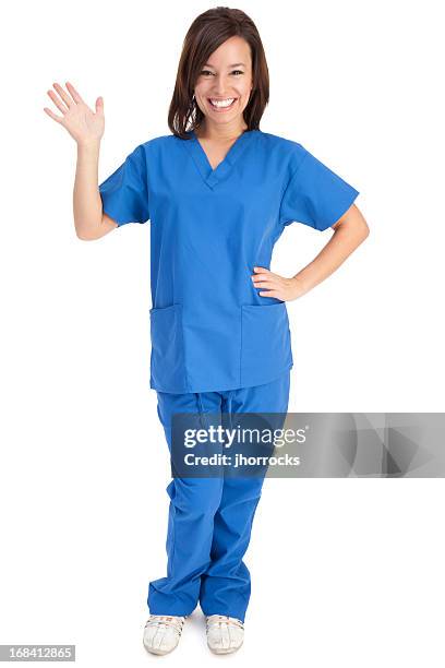 young friendly nurse in blue scrubs - brown hair waves stock pictures, royalty-free photos & images