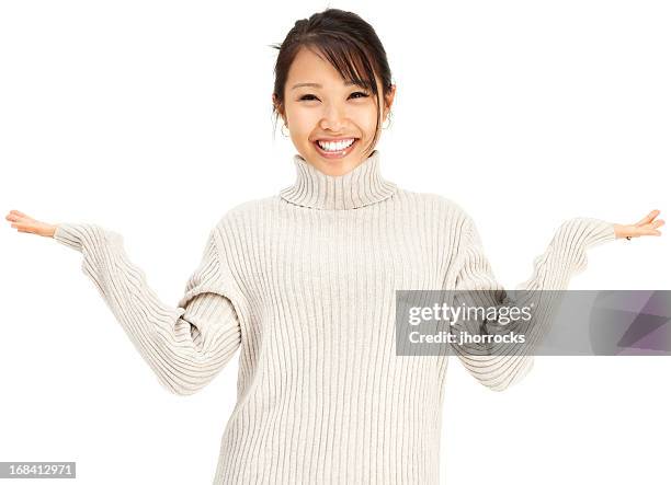 attractive young asian woman in gray sweater shrugging - shrug shoulders stockfoto's en -beelden