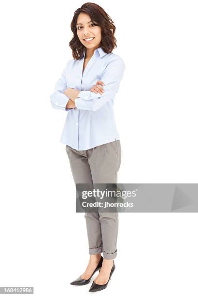 attractive young hispanic businesswoman - grey trousers 個照片及圖片檔