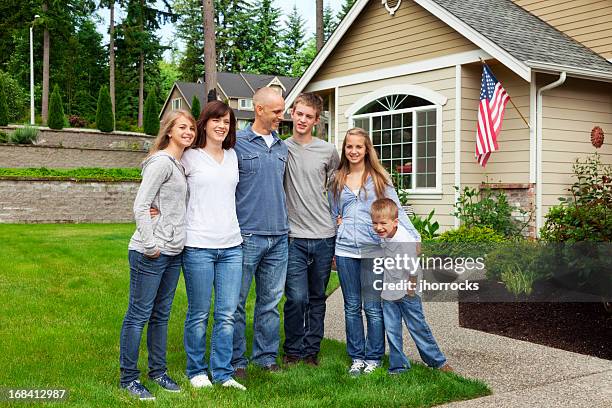 happy family of six at home - american flag on stand stock pictures, royalty-free photos & images