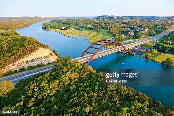 pennybacker 360 bridge, colorado river, austin texas, aerial panorama - austin texas aerial stock pictures, royalty-free photos & images