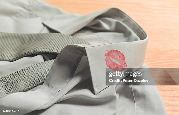 lipstick on collar - lying stock pictures, royalty-free photos & images