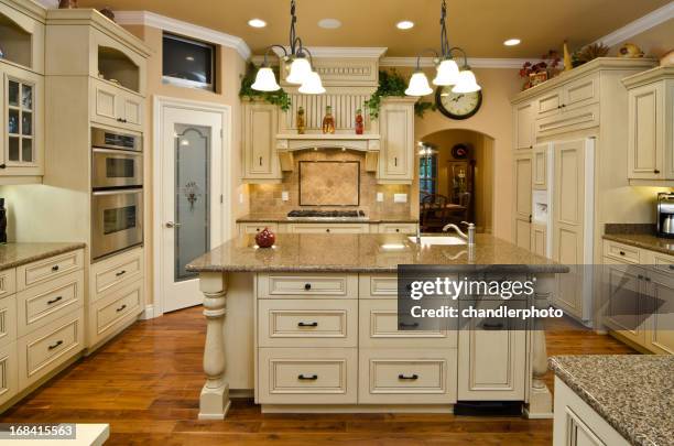 modern kitchen with matching island - vintage microwave stock pictures, royalty-free photos & images