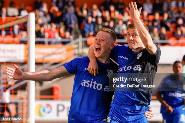 Brian de Keersmaecker of Heracles Almelo scores the 0-1, celebratring , Emil Hansson of Heracles Almelo celebrating his goal with teammates during...