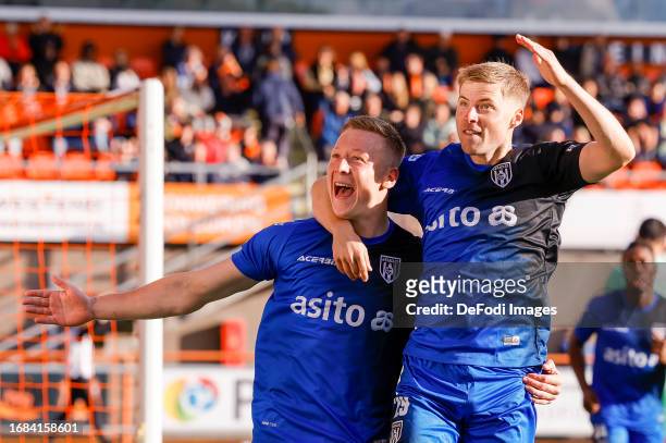 Brian de Keersmaecker of Heracles Almelo scores the 0-1, celebratring , Emil Hansson of Heracles Almelo celebrating his goal with teammates during...