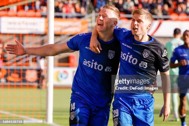 Brian de Keersmaecker of Heracles Almelo scores the 0-1, celebratring , Emil Hansson of Heracles Almelo celebrating his goal with teammates during...