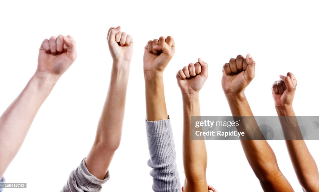 Many clenched fists raised against white background