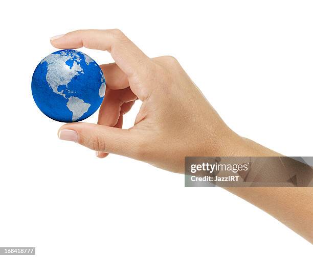 human hand holding earth - holding hands around globe stock pictures, royalty-free photos & images