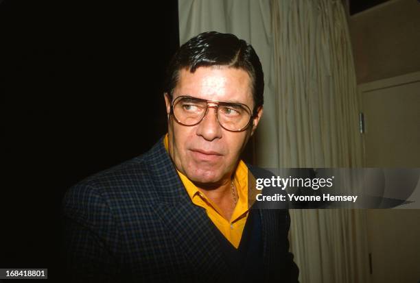 Jerry Lewis is photographed leaving a press conference October 16, 1986 in New York City to announce the discovery of the mutated gene that causes...