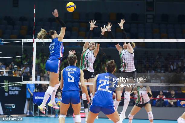 Lazovic Katarina of Serbia competes against Rodriguez Gomez Maria Fernanda and Castro Lopez Grecia Esther of Mexico in the FIVB Volleyball Women's...