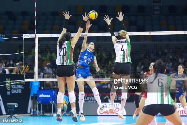 Bjelica Ana of Serbia competes against Topete Pardo Aime Margarita and Rodriguez Gomez Maria Fernanda of Mexico in the FIVB Volleyball Women's...