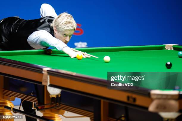 Neil Robertson of Australia plays a shot in the Semi-final match against Luca Brecel of Belgium on day 6 of World Snooker Shanghai Masters 2023 at...