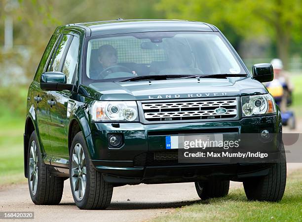 Prince Philip, Duke of Edinburgh drives himself in his Land Rover Freelander to watch the dressage phase of the Land Rover International Driving...