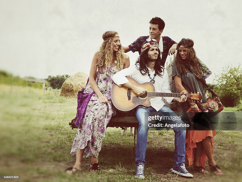 Group of Hippie Singing in Countryside