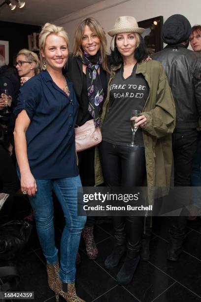 Gabrielle Duplooy, Nicole Appleton and Natalie Appleton attend an exhibition of unseen Abbey road and rare David Bowie photographs by Iain Macmillan...