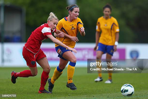 Alex Windell of Bristol Academy FC challenges Emma Thomson of Doncaster Belles Ladies FC during the The FA WSL match between Bristol Academy Women's...