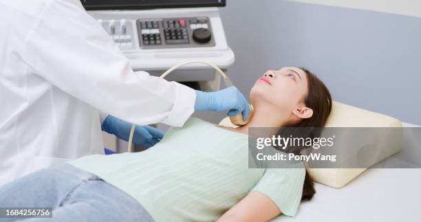 neck or thyroid ultrasound examination - hypothyroidism stock pictures, royalty-free photos & images