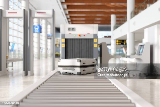 airport security checkpoint with x-ray scanner machine and luggages - airport x ray images stock pictures, royalty-free photos & images