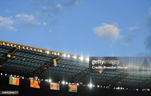 Paris , France - 23 September 2023; The setting sun falls onto the team flags before the 2023 Rugby World Cup Pool B match between South Africa and...