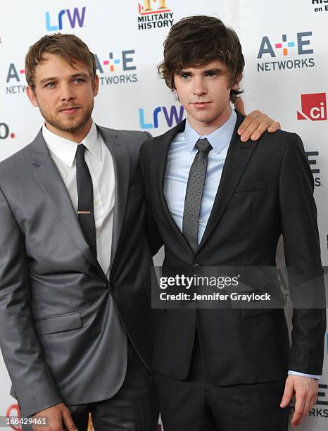 Actor Max Thieriot and Actor Freddie Highmore attend the A+E Networks 2013 Upfront at Lincoln Center on May 8, 2013 in New York City.