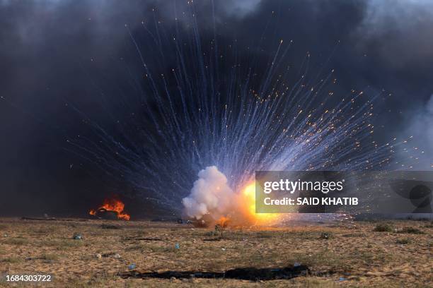 Bomb explodes during clashes between Palestinian demonstrators and Israeli security forces east of Rafah in the southern Gaza Strip near the...