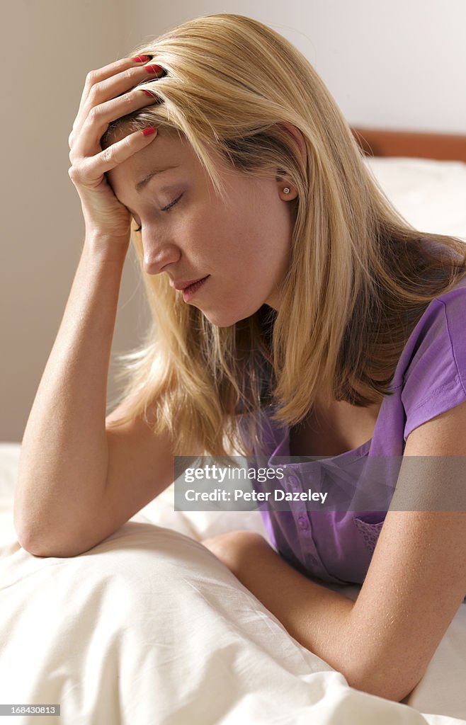 Young woman with headache