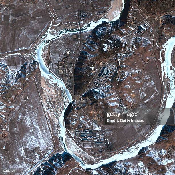 This satellite image of North Korea's Yongbyon Nuclear facility was taken in February 2002. North Korea said December 12 it will reactivate a nuclear...