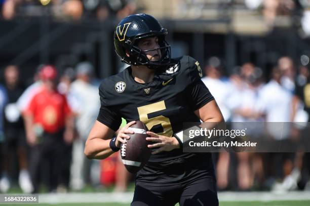 Swann of the Vanderbilt Commodores looks to pass the ball in the first half of a game against the Kentucky Wildcats at FirstBank Stadium on September...