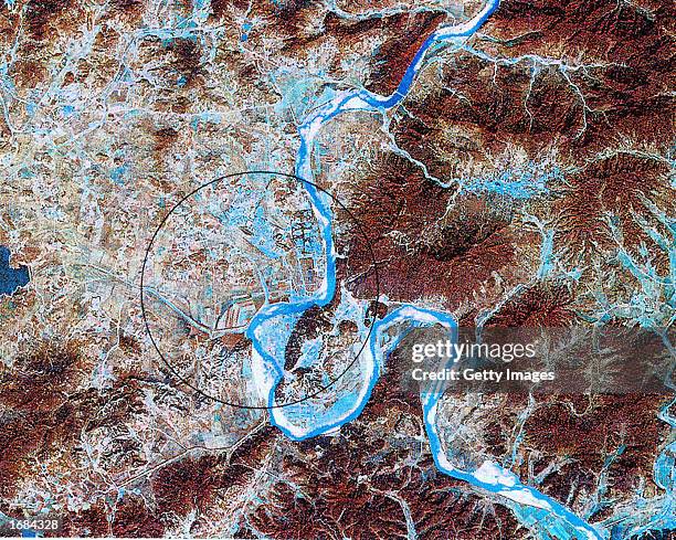 This satellite image of North Korea's Yongbyon Nuclear facility was taken in February 2002. North Korea said December 12 it will reactivate a nuclear...