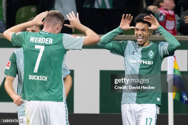 Marvin Duksch and Justin Njinmah of Werder Bremen celebrating during the Bundesliga match between SV Werder Bremen and 1. FC Köln at Wohninvest...