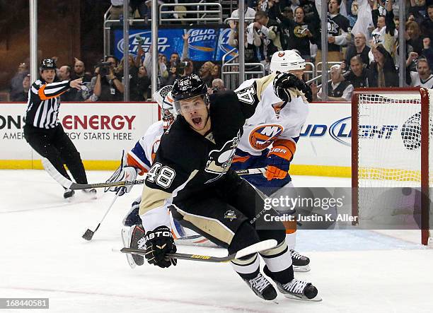 Tyler Kennedy of the Pittsburgh Penguins celebrates his second period goal against the New York Islanders in Game Five of the Eastern Conference...