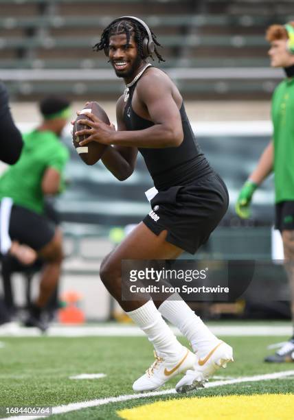 Colorado Buffaloes quarterback Shedeur Sanders warms up prior to the start of the game between the Colorado Buffaloes and Oregon Ducks on September...
