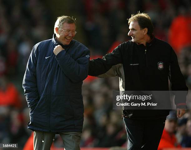 Liverpool assistant manager Phil Thompson shares a joke with Manchester United manager Alex Ferguson during the FA Barclaycard Premiership match...