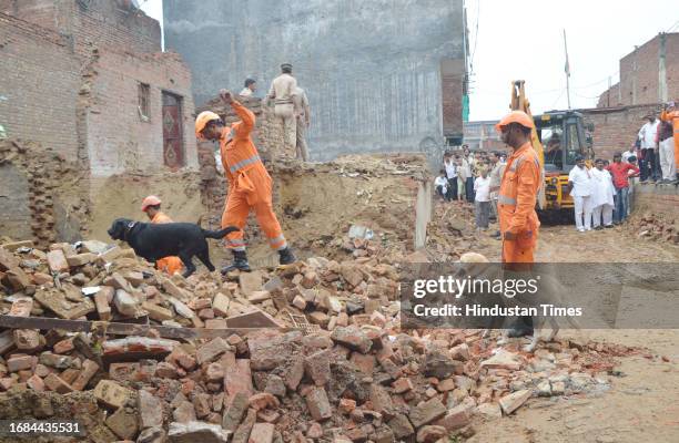 Personnel carry out rescue operations after a two-storeyed building collapse in Loni's Roop Nagar on September 23, 2023 in Ghaziabad, India.