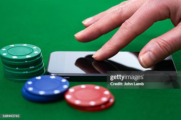 touchscreen betting - casino tables hands stock pictures, royalty-free photos & images