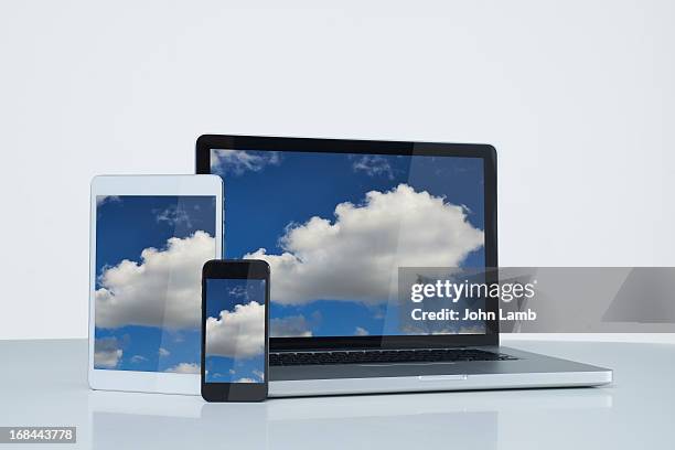 cloud computing - laptop on white background stock-fotos und bilder