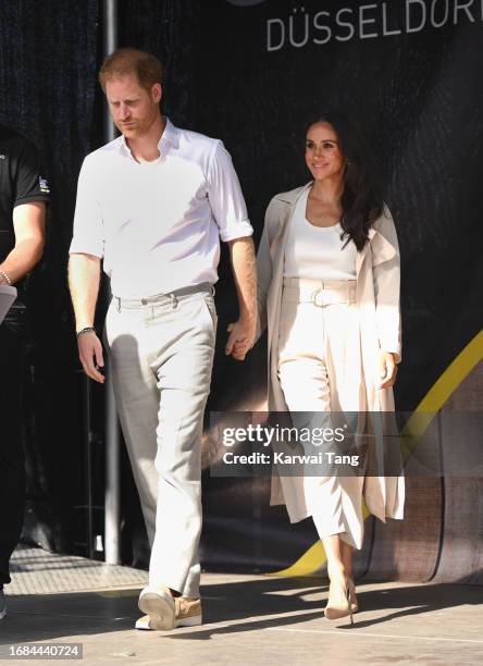 Prince Harry, Duke of Sussex and Meghan, Duchess of Sussex attend the swimming medal ceremony during day seven of the Invictus Games Düsseldorf 2023...