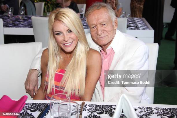 Playmate Crystal Hefner and Founder of Playboy Enterprises Hugh Hefner attend the 2013 Playboy Playmate of the Year announcement and reception held...