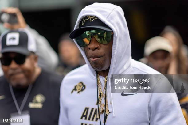 Head coach Deon Sanders of the Colorado Buffaloes walks on the field before their game against the Oregon Ducks at Autzen Stadium on September 23,...