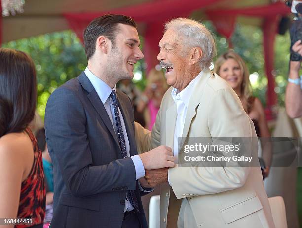 Cooper Hefner and Keith Hefner attend Playboy's 2013 Playmate Of The Year luncheon honoring Raquel Pomplun at The Playboy Mansion on May 9, 2013 in...