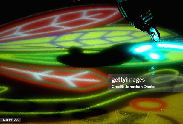 Member of the Chicago Blackhawks skates onto the ice during player introductions before taking on the Minnesota Wild in Game Five of the Western...