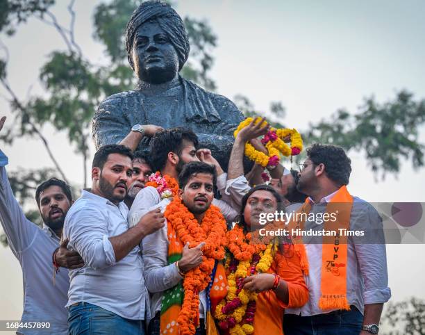 Candidates Tushar Dedha , Aprajiita, and Sachin Baisla celebrating after winning all the three posts in the Delhi University Students Union...