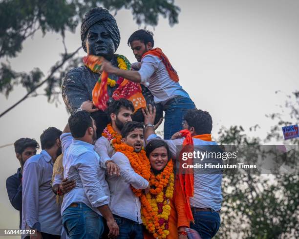 Candidates Tushar Dedha , Aprajiita, and Sachin Baisla celebrating after winning all the three posts in the Delhi University Students Union...