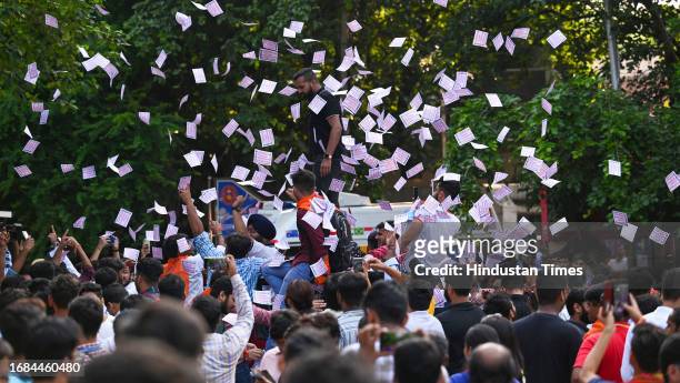 Supporters celebrating after winning all the three posts in the Delhi University Students Union elections, at Delhi University north campus on...