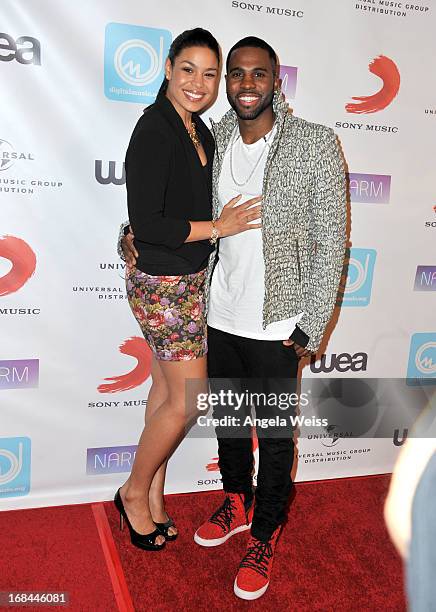 Singer Jordin Sparks and singer Jason Derulo attend the 2013 Music Biz Awards presented by NARM and digitalmusic.org at the Hyatt Regency Century...