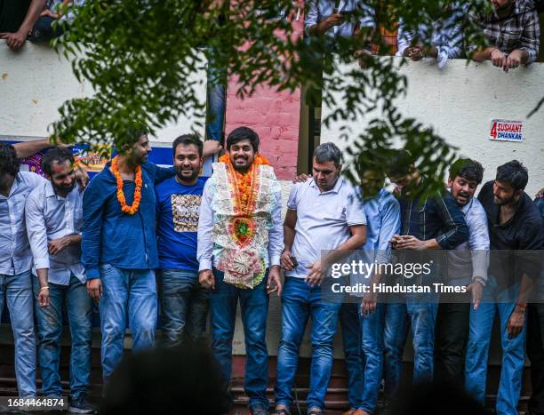 Candidate Abhi Dhaiya celebrating after winning the posts in the Delhi University Students Union elections, at Delhi University north campus on...