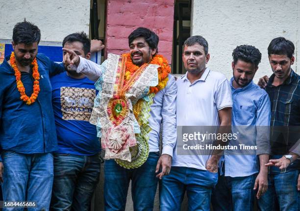 Candidate Abhi Dhaiya celebrating after winning the posts in the Delhi University Students Union elections, at Delhi University north campus on...
